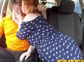 Fake driving school voluptuous redhead fucks in car