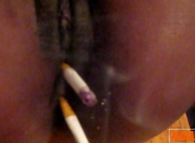 Hot black lesbian smoking with pussy